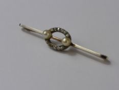 A Yellow and White Gold Diamond and Pearl Stick Pin, the pin set with six old cut diamonds in a