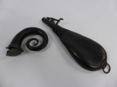 An Antique Leather Shot Flask together with a rams horn snuff mull. (2)
