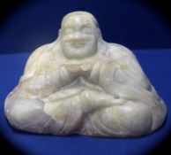 Chinese Antique Celadon Jade Figure of a Seated Buddha, the Buddha carved from a large boulder, with