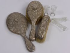 A Lady's Silver Dressing Table Set comprising hair brush, clothes brush, mirror, a set of glass