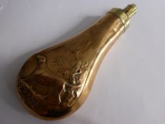 An Antique Copper and Brass Powder Flask, with embossed figure of a hunting dog in landscape