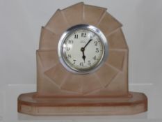 A British Art Deco 30 Hour Time Piece, silvered face with Roman numerals and signed Anvil