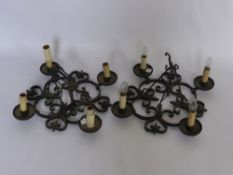 A Pair of Wrought Iron Ceiling Lights, with decorative scroll design.