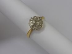 A Lady's 18ct Gold and Platinum Diamond Ring, the ring set with nine old cut diamonds, size O,