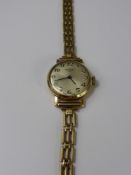 A Lady's 9ct Yellow Gold Rotary Watch on a 9ct Gold Bracelet.