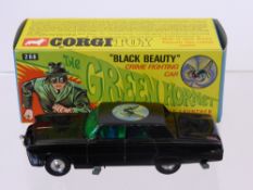 A Boxed Corgi Toy of the Green Hornet Car Crime Fighting Car called Black Beauty.