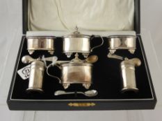 A Sterling Silver Cruet comprising mustard (original blue liner), salts (original blue liners) and