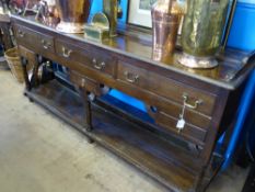 An Antique Oak Dresser Base, three drawers to top, three drawers to bottom, the dresser base on