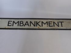 A London Underground Enamel Sign, depicting 'Embankment/Charing Cross'.