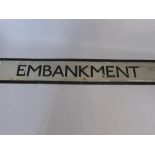 A London Underground Enamel Sign, depicting 'Embankment/Charing Cross'.