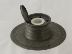 An Antique Pewter Ink Well with the original porcelain liner, a hammered pewter lamp base