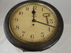 An 8-day Oak Cased Smith Wall Clock, enamel face and dial approx 40x 40 cms.