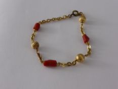 An 18 ct Gold and Coral Bracelet, approx 4.4 gms, clasp base metal.