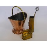 A Hammered Copper Coal Scuttle together with three Fireside Implements housed in a brass mortar