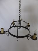 A Four Branch Cast Iron Game Crown, with ten game hooks, converted for electricity.