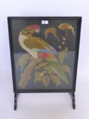 A Wool Tapestry depicting a Parrot, approx 41 x 55 cms, framed and glazed.