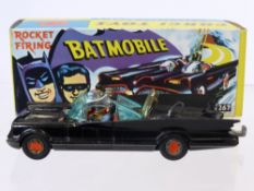 A Boxed Corgi Toy of Batman & Robin in the Batmobile. .