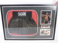 A Signed Pair of Black Boxing Trunks signed and embroidered Calzaghe, approx 77 x 108 cms, the