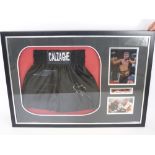 A Signed Pair of Black Boxing Trunks signed and embroidered Calzaghe, approx 77 x 108 cms, the