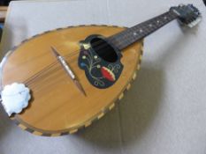 A Vintage Mandolin, decorated with flowers.