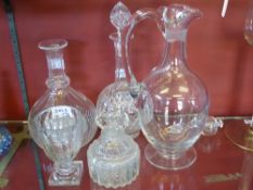 A Quantity of Glass including, three decanters, one rummer glass and a jug. (5)