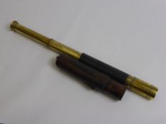 A Mid 19th Century Three Draw Brass Telescope, by Ross of London, original leather covering and