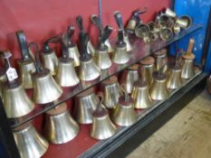 A Peel of Brass Hand Bells, hand stitched leather handles, the leather handles inscribed B R Barnett