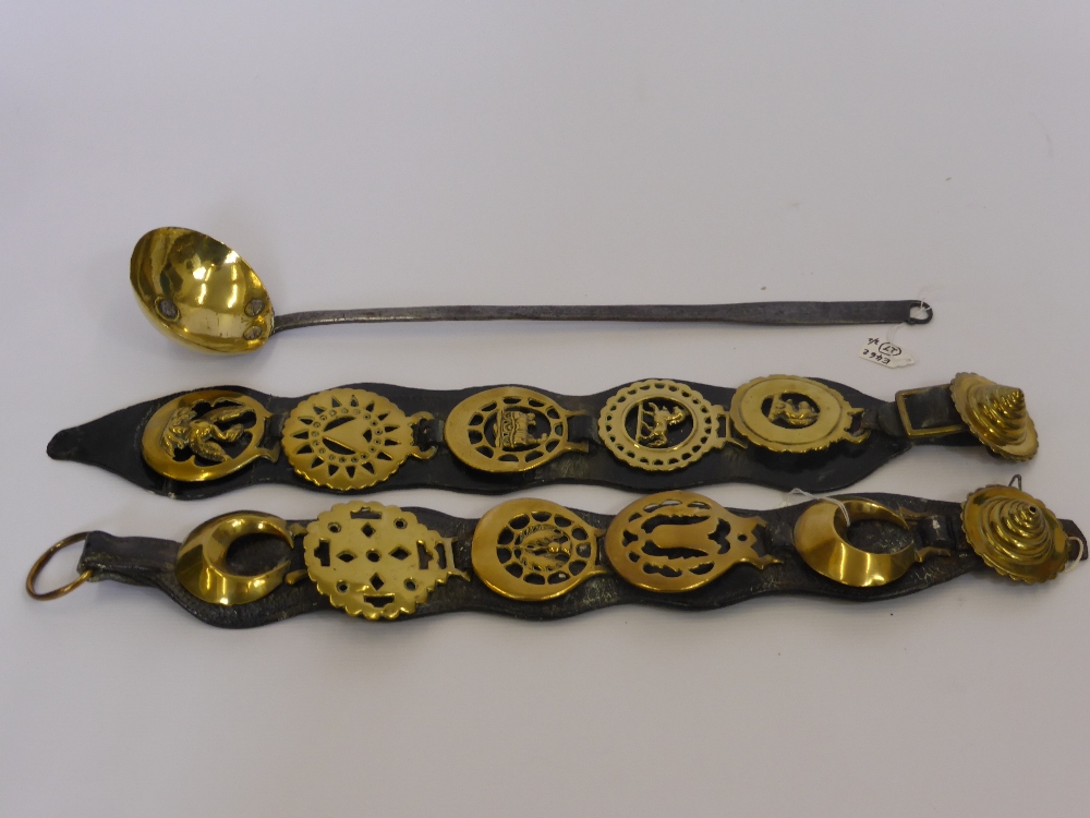 Two Leather Horse Harnesses with five horse brasses to each together with a brass and wrought iron