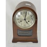 An Edwardian Oak Case Mantle Clock approx 30 cms high.