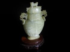 Chinese 20th Century Pale Celadon Jade Vase and Cover. The vase carved with Taotie in shallow relief