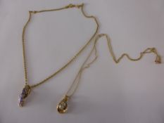 A Lady's 10 K Gold, White Stone Pendant and chain together with 925 pendant and chain. (2)