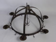 A Large Antique Cast Iron Game Crown, with twelve game hooks, converted for electricity.