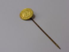 A Gold Coin Tie Stick,