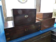 Four Mahogany Stationary Boxes, box 1 45 x 25 x 15 cms, box 2 35 x 23 x 17 cms, box 3 28 x 20 x