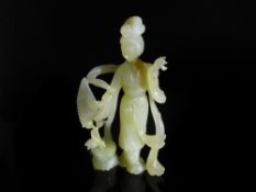 Chinese 20th Century Pale Celadon Jade Figure of Guanyin, the fine figure having ornately carved