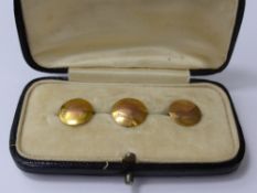 Three Gentleman's 9ct Gold Dress Studs in the original box, approx 2.5 gms.