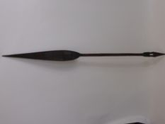 A 19th Century Polynesian Ceremonial Paddle, measuring 138 cms with intricately carved decoration.