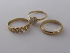 Three 9 ct Gold Rings, including wedding band, solitaire C.Z and a white stone ring size L/M.