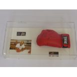 A Mike Tyson Heavy Weight Champion Longsdale Boxing Glove signed Mike Tyson. The boxing glove