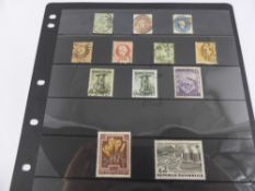 A Collection of pre-WWII Austrian Stamps, dated 1860 - 1930 stock pages.