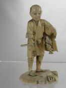 An Antique Ivory Carved Okimono, the figure depicting a man carrying a basket of leaves, red