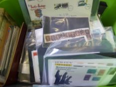 A Box of Worldwide Stamps in Envelopes, albums etc., together with a large number of commemorative