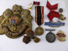 A Collection of Miscellaneous Medals and Cloth Badges. including WW1 to P.T.E. 102012 L.J. Dykes R.