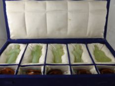 A Collection of Five Apple Green Jade figures depicting various characters in original box, approx