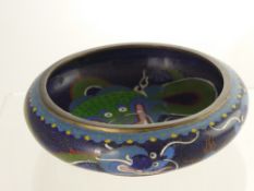 An Antique Chinese Cloisonné Bowl depicting chasing dragons, the bowl having dragon to inside with