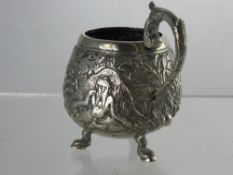 An Antique Indian Silver  Handled Tri-footed Cup, chased with a hunting scene, approx 80 gms