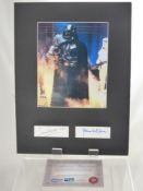 A Photograph of Starwars Character Darth Vader, with signature of James Earl Jones and Dave