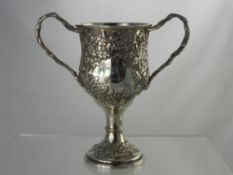 A Fine Victorian Double Handled Presentation Cup, the cup embossed with acorn leaf and bud and