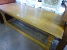 A Pine Coffee Table, on turned legs with four stretchers approx 121 x 51 x 46 cms.