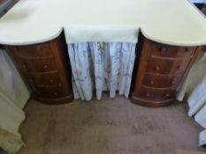 An Art Deco Mahogany Bespoke Kidney Shaped Ladies Dressing Table, the table having two bow fronted